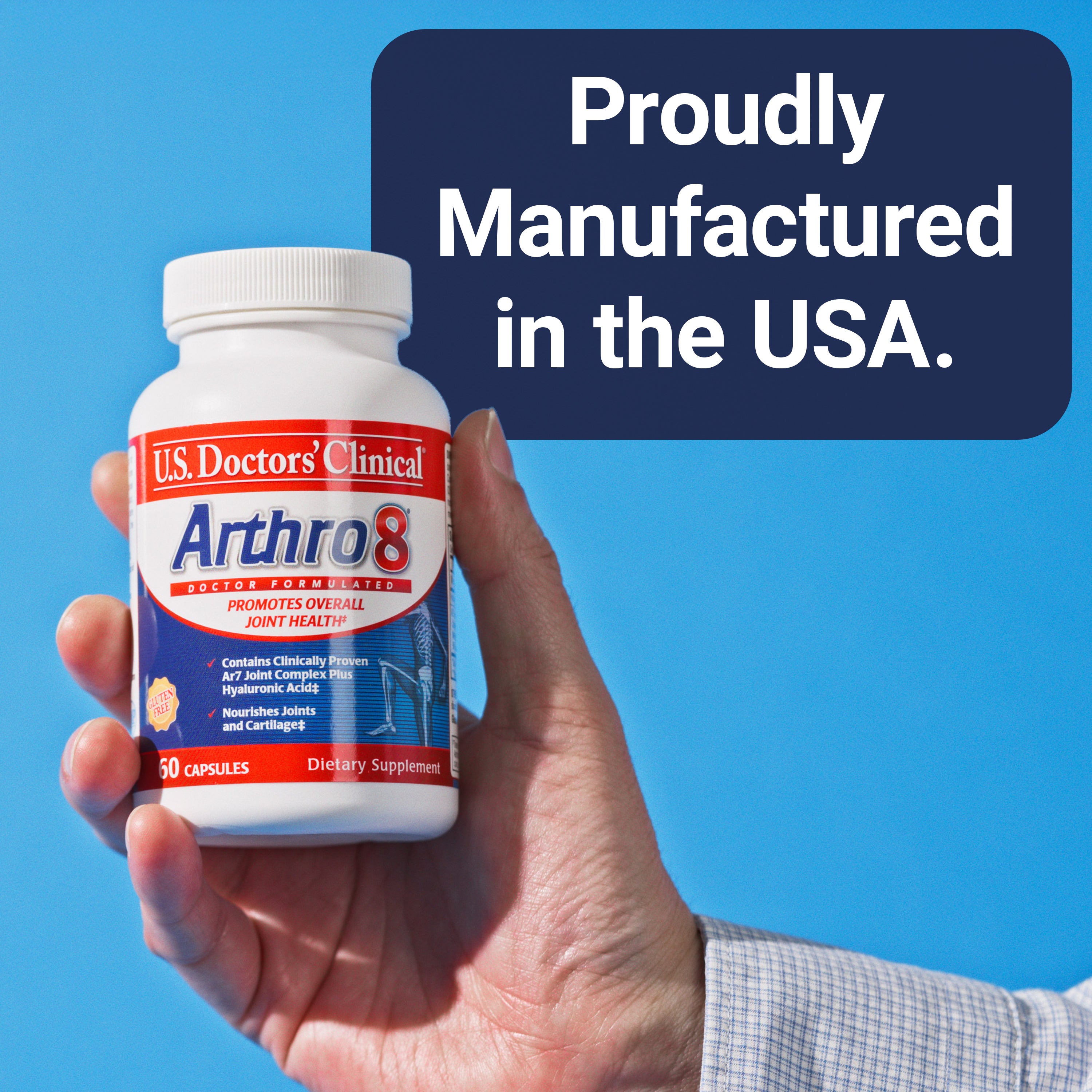 U.S. Doctors' Clinical Arthro8 bottle being held by a man on a blue background with text saying "Proudly Manufactured in the USA"