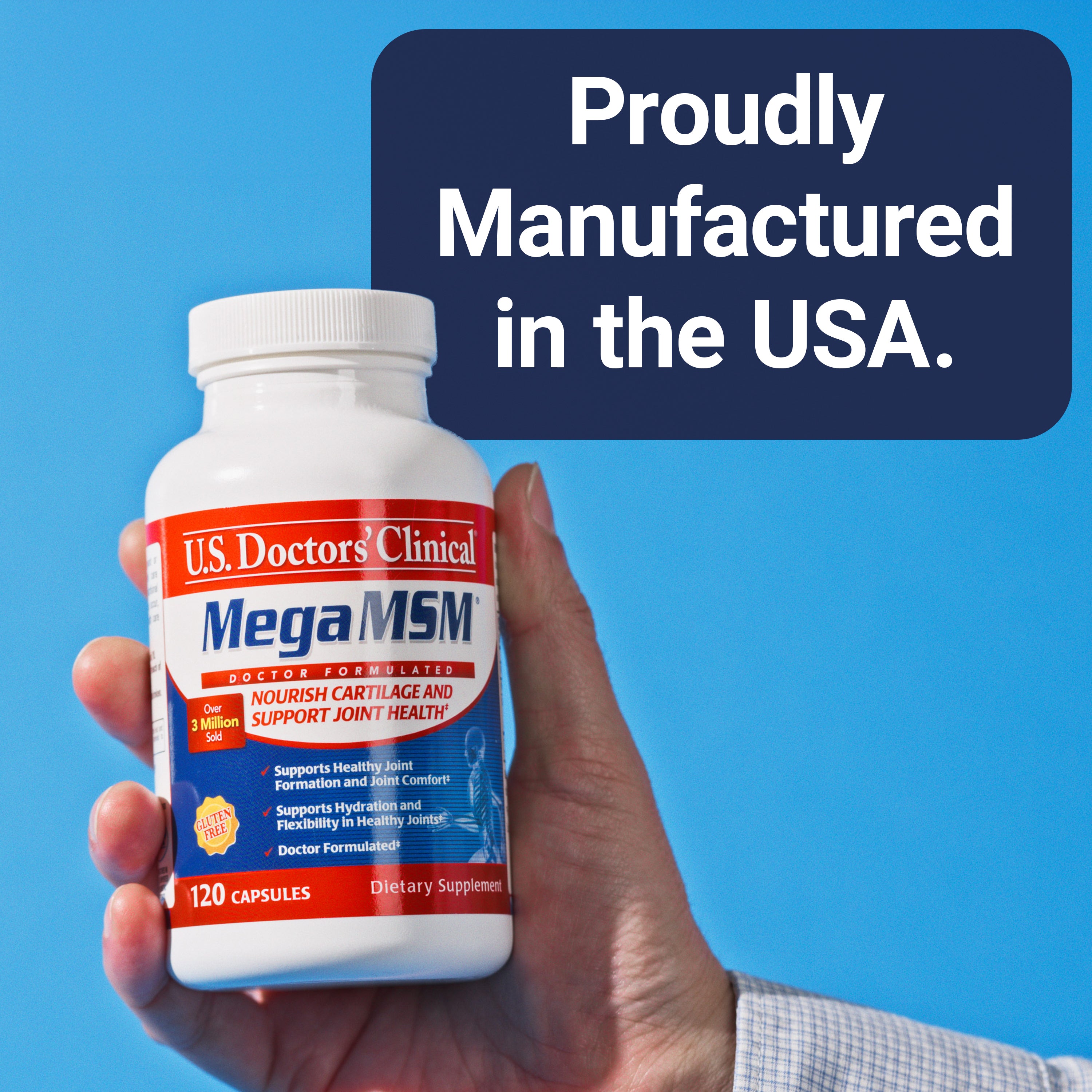 Hand holding a bottle of U.S. Doctors' Clinical Mega MSM supplement with a blue background and text about 'Manufactured in the USA'.