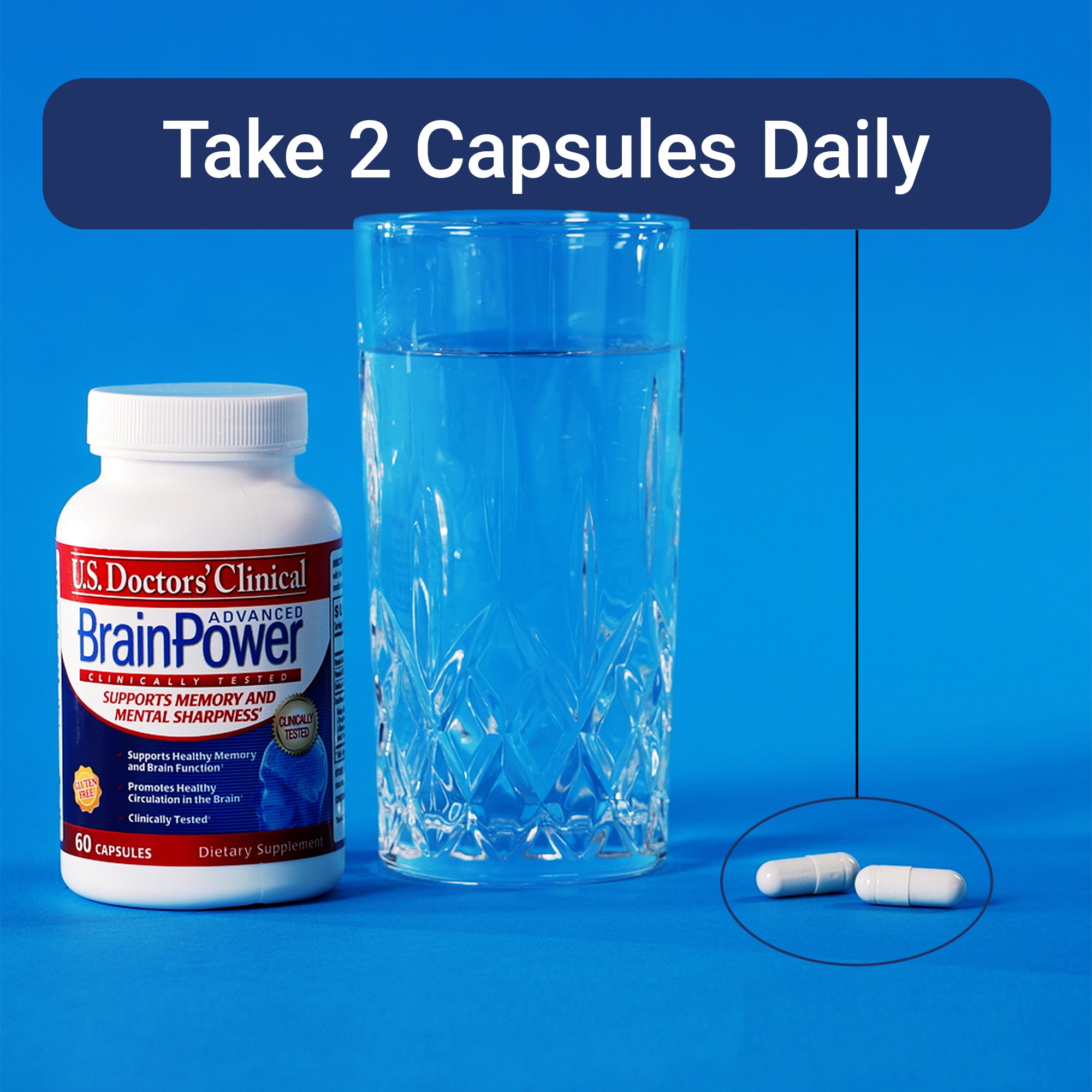U.S. Doctors' Clinical BrainPower supplement bottle with a glass of water on a blue background